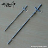 MechaNaka's Gunpla weapon - A miniature jumonji yari / jumonji spear. A jumonji yari is a traditional Japanese cross-shaped spear. It became a very iconic weapon used by Sanada Yukimura, a Sengoku period samurai often praised as "The Best Soldier of Japan". Assembly instructions.